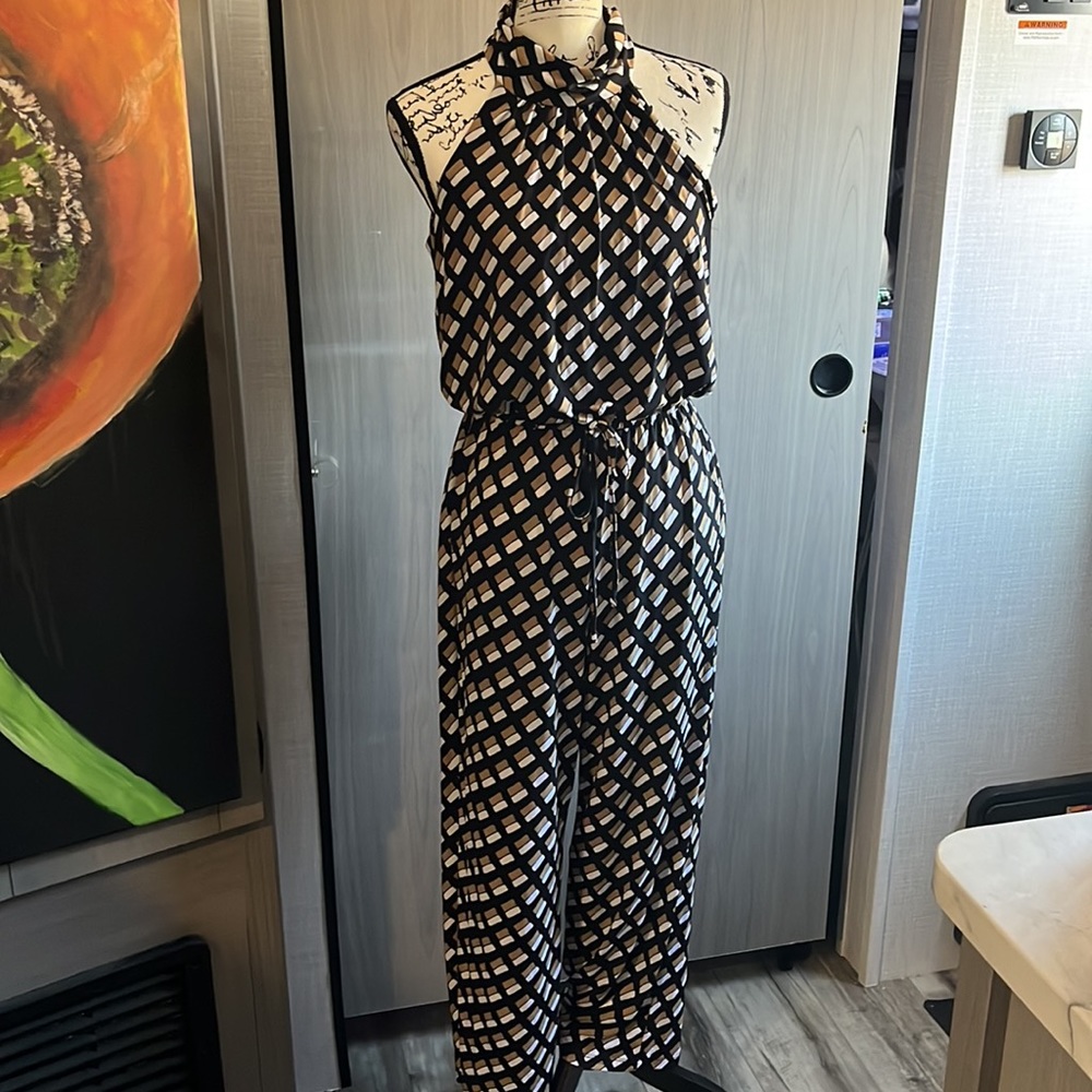 Sleeveless turtleneck jumpsuit